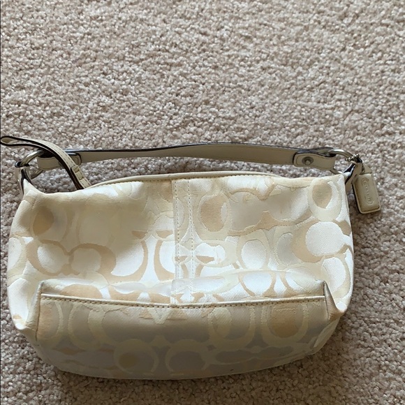 coach cream bag